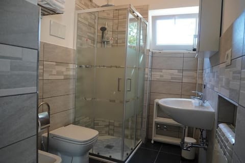 Triple Room, Private Bathroom | Bathroom | Shower, towels, soap, toilet paper