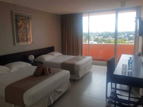 Deluxe Double Room, Balcony, City View | Desk, iron/ironing board, free WiFi