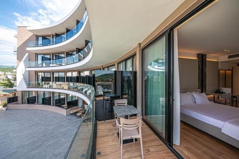 Junior Suite with Balcony and Sea View | 1 bedroom, minibar, in-room safe, desk