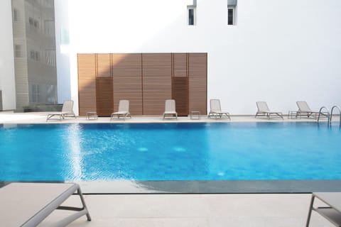 Outdoor pool, sun loungers