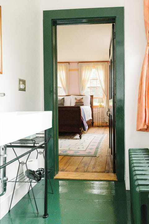 Elegant Room at Eileen of Mystic | Bathroom | Hair dryer, towels, soap, shampoo