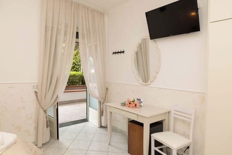 Standard Triple Room, Garden View | Desk, free WiFi