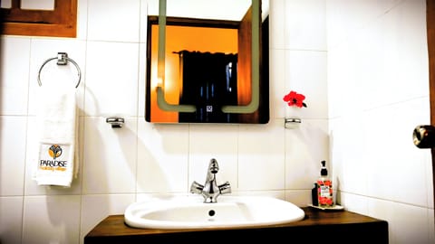 Suite, Garden View | Bathroom | Shower, rainfall showerhead, free toiletries, hair dryer