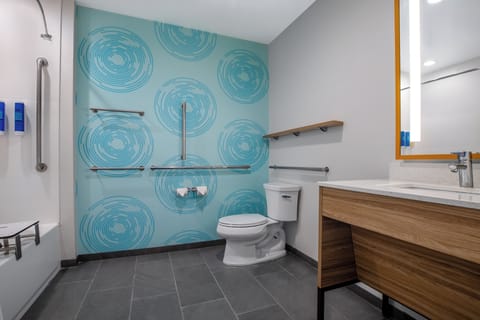 Combined shower/tub, hair dryer, towels, soap