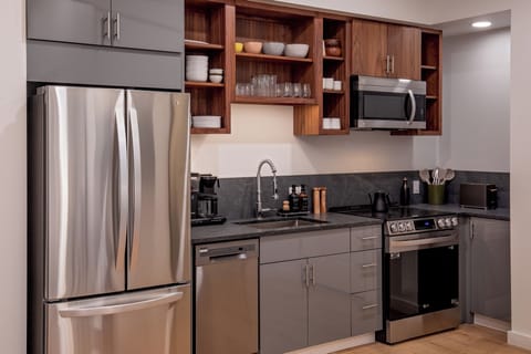 Studio Suite, 1 King Bed | Private kitchen | Full-size fridge, microwave, oven, stovetop