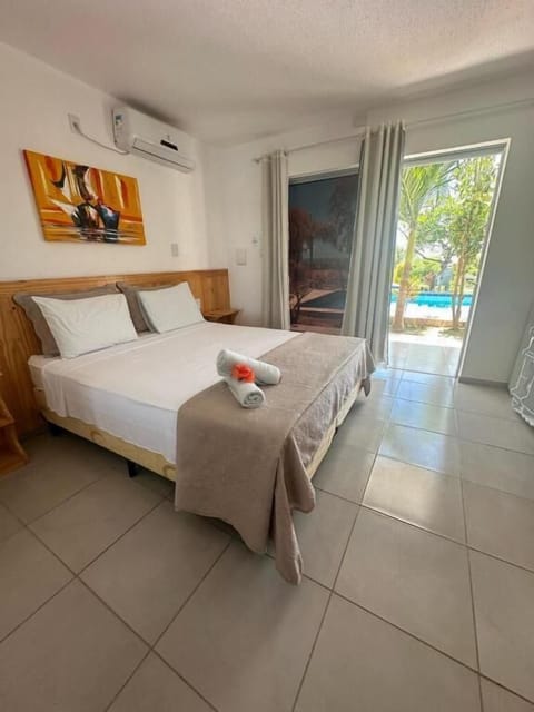 Double Room, Pool View | In-room safe, iron/ironing board, free WiFi