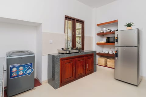 Room code: Three-Bedroom Villa Second Floor | Private kitchen | Full-size fridge, microwave, stovetop, electric kettle