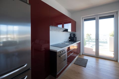 Superior Apartment, Sea View | Private kitchen | Full-size fridge, oven, stovetop, dishwasher