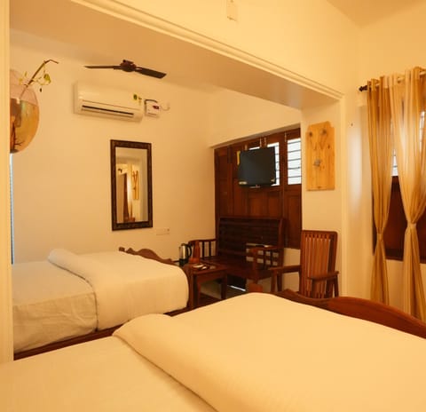 Family Room | Premium bedding, desk, free WiFi, bed sheets