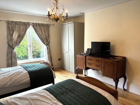 Deluxe Twin Room, Garden View | In-room safe, iron/ironing board, free WiFi