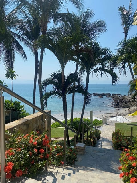 Private beach, white sand, sun loungers, beach umbrellas