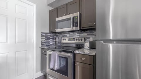 Apartment, 2 Bedrooms | Private kitchen | Full-size fridge, oven, stovetop, dishwasher