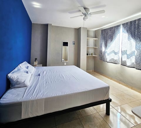 Economy Room, 1 Bedroom | Laptop workspace, blackout drapes, iron/ironing board, free WiFi