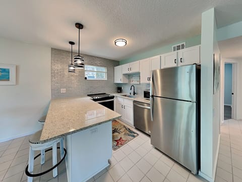 House, Multiple Beds, Patio, Garden View (Beach House Manor (No Pets Allowed)) | Private kitchen | Fridge, microwave, oven, stovetop