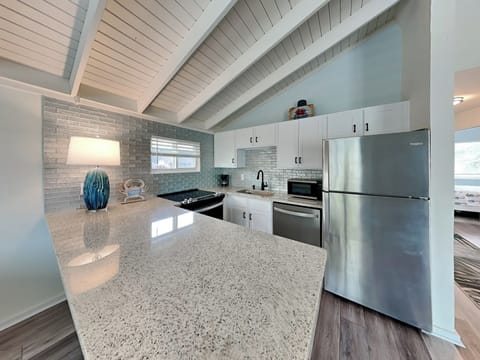 House, Multiple Beds, Patio, Garden View (Beach House Upper - No Pets Allowed) | Private kitchen | Fridge, microwave, oven, stovetop