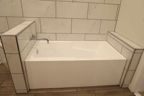 Separate tub and shower, hair dryer, towels, soap