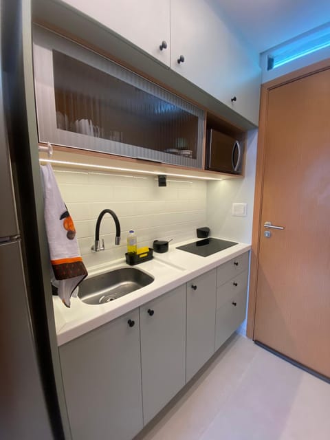 Design Apartment | Private kitchen | Fridge, microwave, stovetop, cookware/dishes/utensils