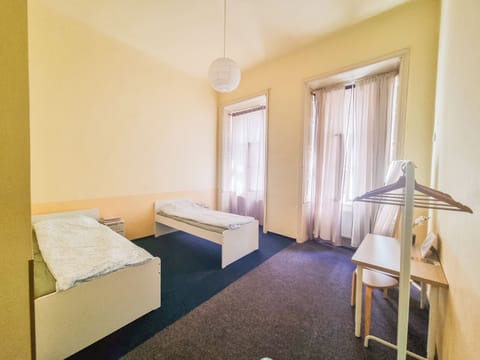 Basic Double Room, Multiple Beds, Non Smoking, Private Bathroom | Free WiFi, bed sheets