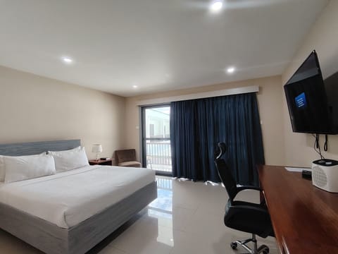 Deluxe Room, Balcony, Mountain View | In-room safe, desk, laptop workspace, iron/ironing board