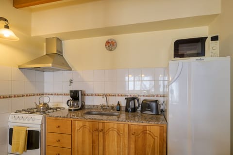 Cabin, 2 Bedrooms | Private kitchen | Full-size fridge, microwave, oven, stovetop