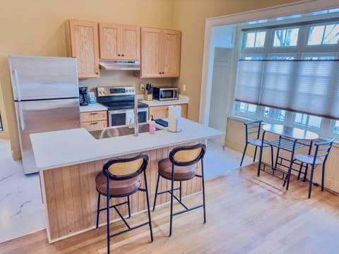 Suite 1, King Bed | Private kitchen | Fridge, microwave, oven, stovetop