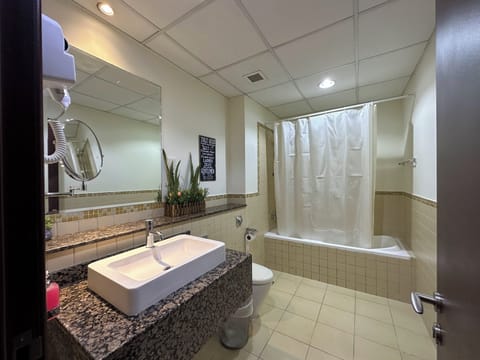 Comfort Shared Dormitory, City View | Bathroom | Separate tub and shower, hair dryer, towels, soap