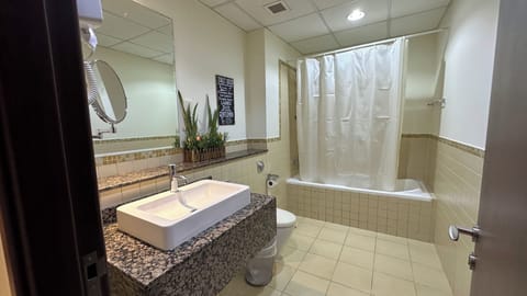 Comfort Shared Dormitory, City View | Bathroom | Separate tub and shower, hair dryer, towels, soap