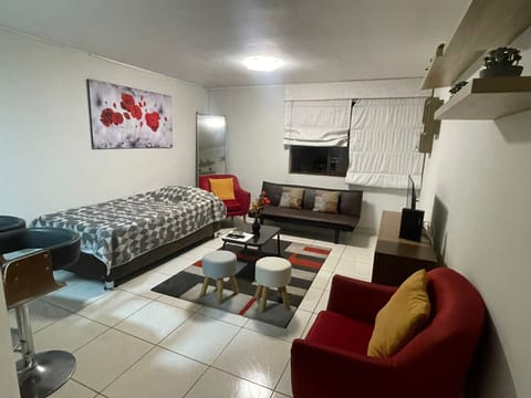 Economy Apartment | Living area | 55-inch Smart TV with digital channels, Netflix, first-run movies