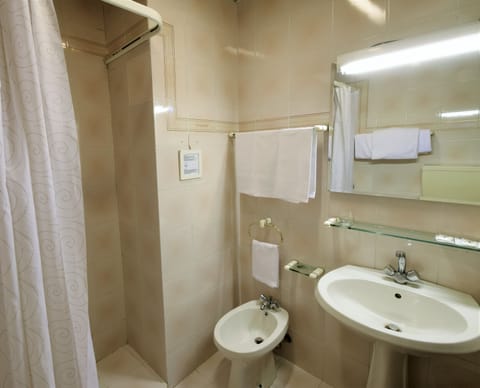 Hair dryer, bathrobes, bidet, towels