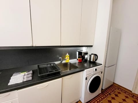 Apartment, 4 Bedrooms | Private kitchen | Espresso maker, coffee/tea maker, electric kettle