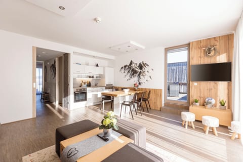 Ferienwohnung mit 2 Schlafzimmern, Dachterrasse & Saunabereich | Living area