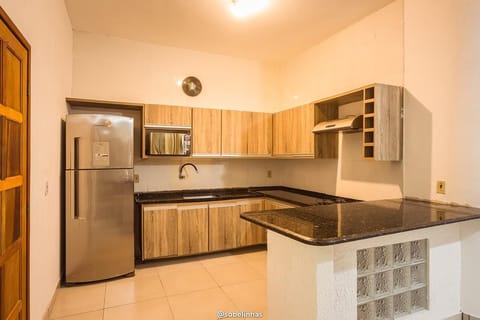 Family Apartment, 3 Bedrooms | Private kitchen | Full-size fridge, oven, cookware/dishes/utensils