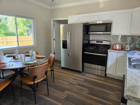 Villa, Multiple Beds, Patio, Garden View (Fab 50's Firestone Flat) | Private kitchen | Fridge, microwave, oven, stovetop