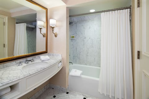 Combined shower/tub, designer toiletries, hair dryer, bathrobes