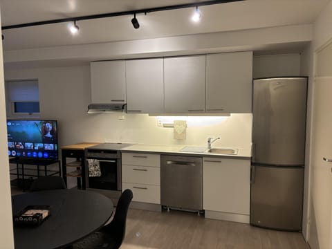 Apartment | Private kitchen | Fridge, oven, stovetop, dishwasher