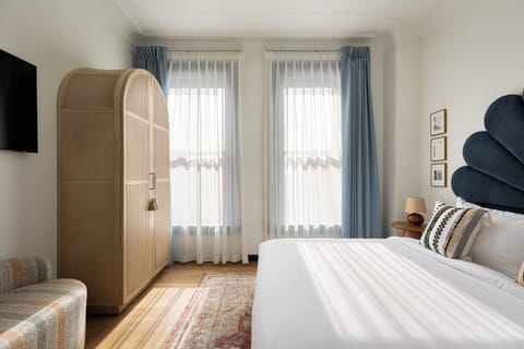 Premium bedding, down comforters, pillowtop beds, free minibar