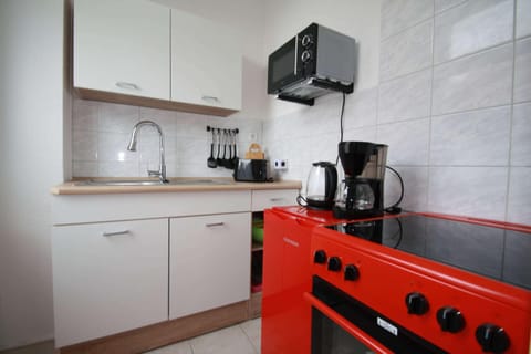Apartment | Private kitchen | Electric kettle, toaster, highchair