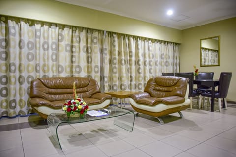 Family Suite, 2 Bedrooms | Living area | Flat-screen TV