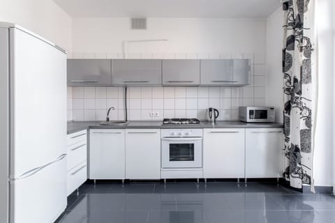 Apartment, City View | Private kitchen | Coffee/tea maker, electric kettle