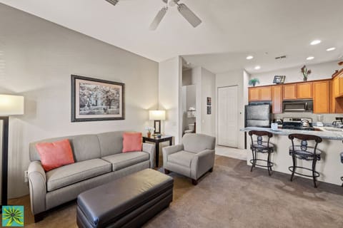 Deluxe Condo | Living area | 55-inch Smart TV with cable channels, fireplace, streaming services