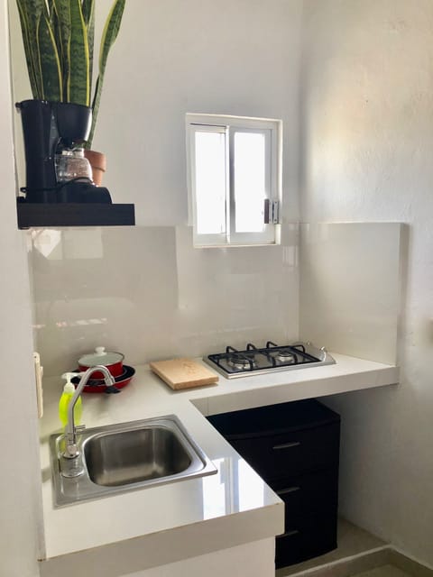 Standard Studio | Private kitchenette | Mini-fridge, microwave, coffee/tea maker, cleaning supplies