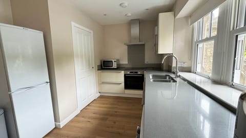 Apartment, 2 Bedrooms | Private kitchen | Fridge, microwave, oven, dishwasher