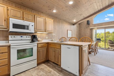 Family Cabin, 2 Bedrooms | Private kitchen | Toaster, cleaning supplies, freezer, paper towels