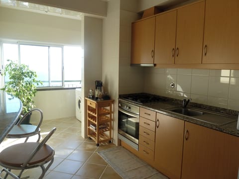 Apartment, Balcony, Sea View | Private kitchen | Electric kettle, toaster