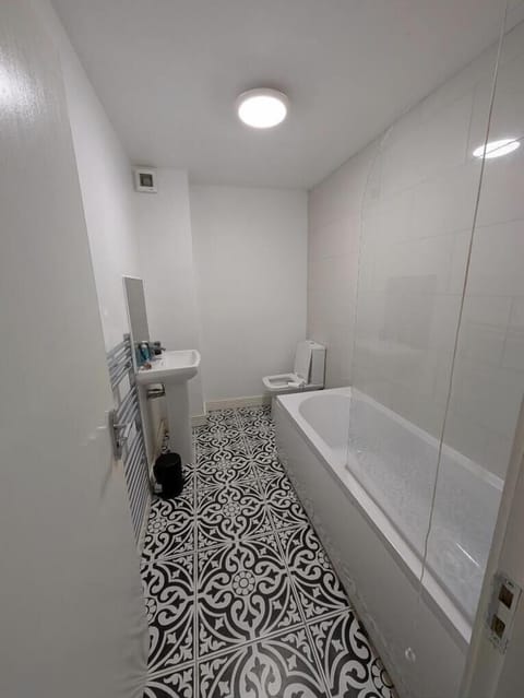 Apartment | Bathroom | Combined shower/tub, deep soaking tub, towels, toilet paper