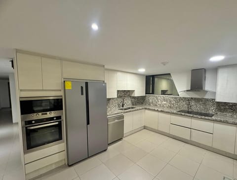 Classic Apartment, City View | Private kitchen | Microwave, coffee/tea maker, toaster, rice cooker