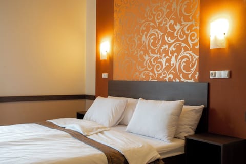 Deluxe Double Room, Garden View | In-room safe, blackout drapes, soundproofing, iron/ironing board