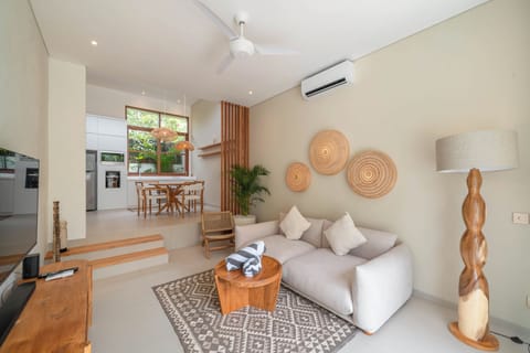 Deluxe Villa, Pool View | Living area | Flat-screen TV