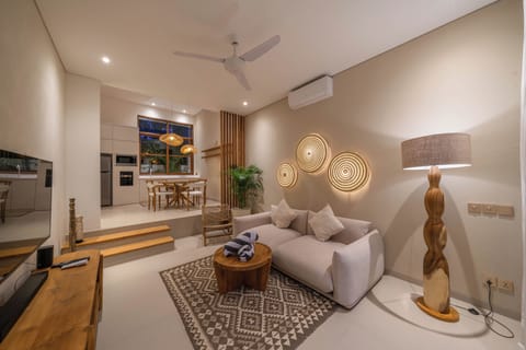 Deluxe Villa, Pool View | Living area | Flat-screen TV