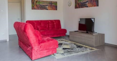 Design Apartment | Living area | 40-inch Smart TV with satellite channels, Netflix, streaming services